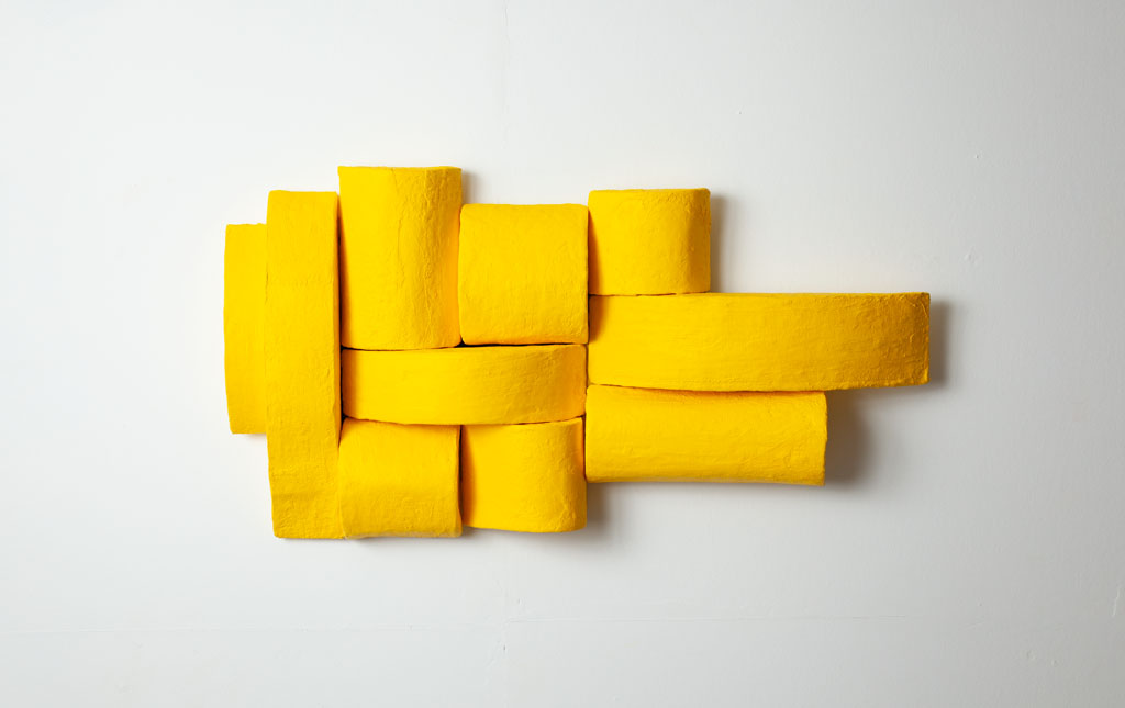 Untitled (yellow), 2023, a sculpture in plaster cloth and cardboard