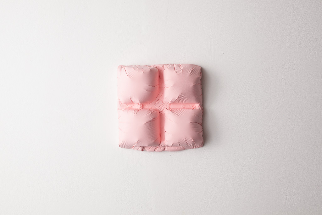 Untitled (pink grid), 2024, a sculpture in plaster and acrylic